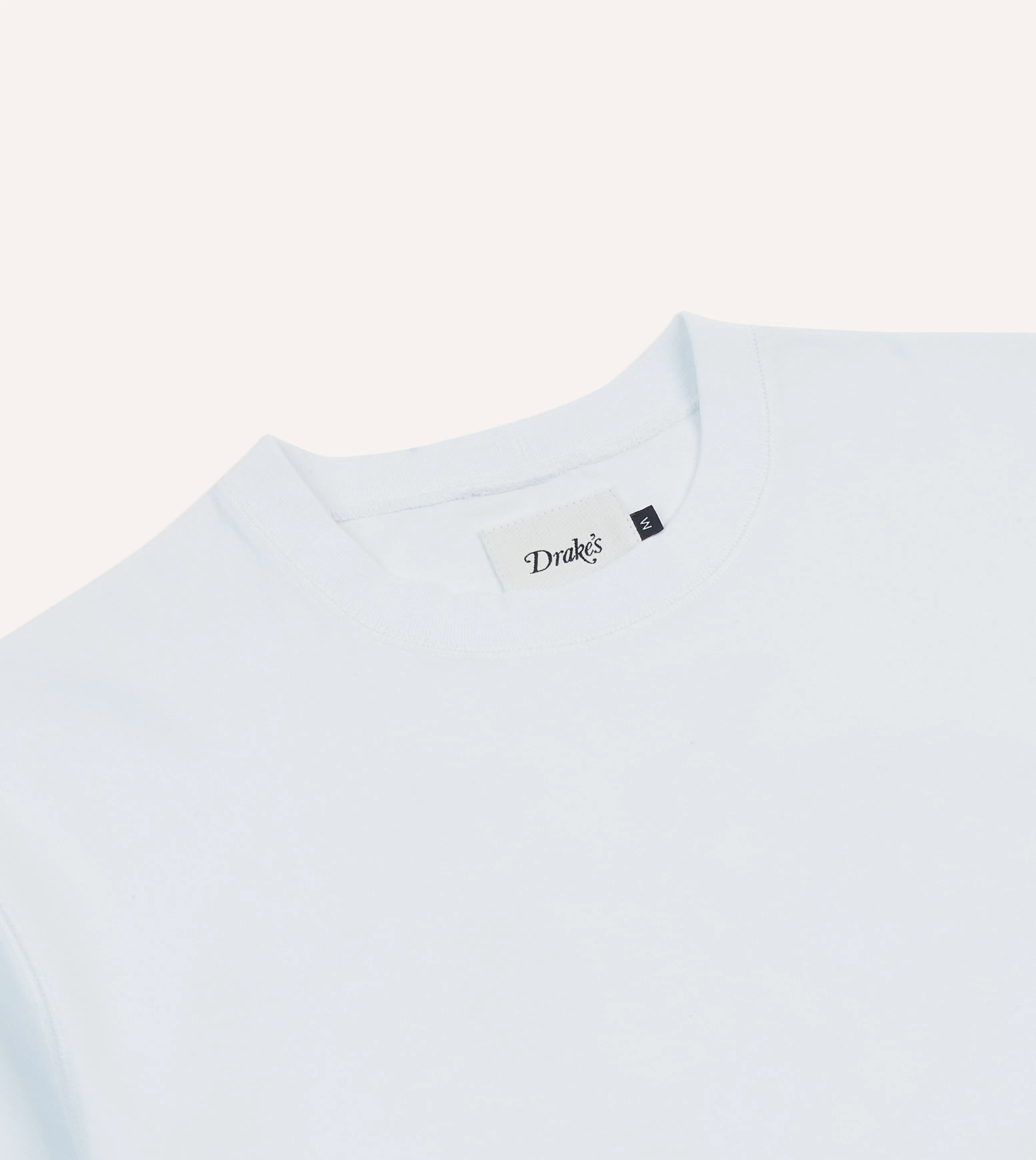 Trendy Comfort SoftenedTexturedWeave Drake??s and New Balance White Graphic T-Shirt