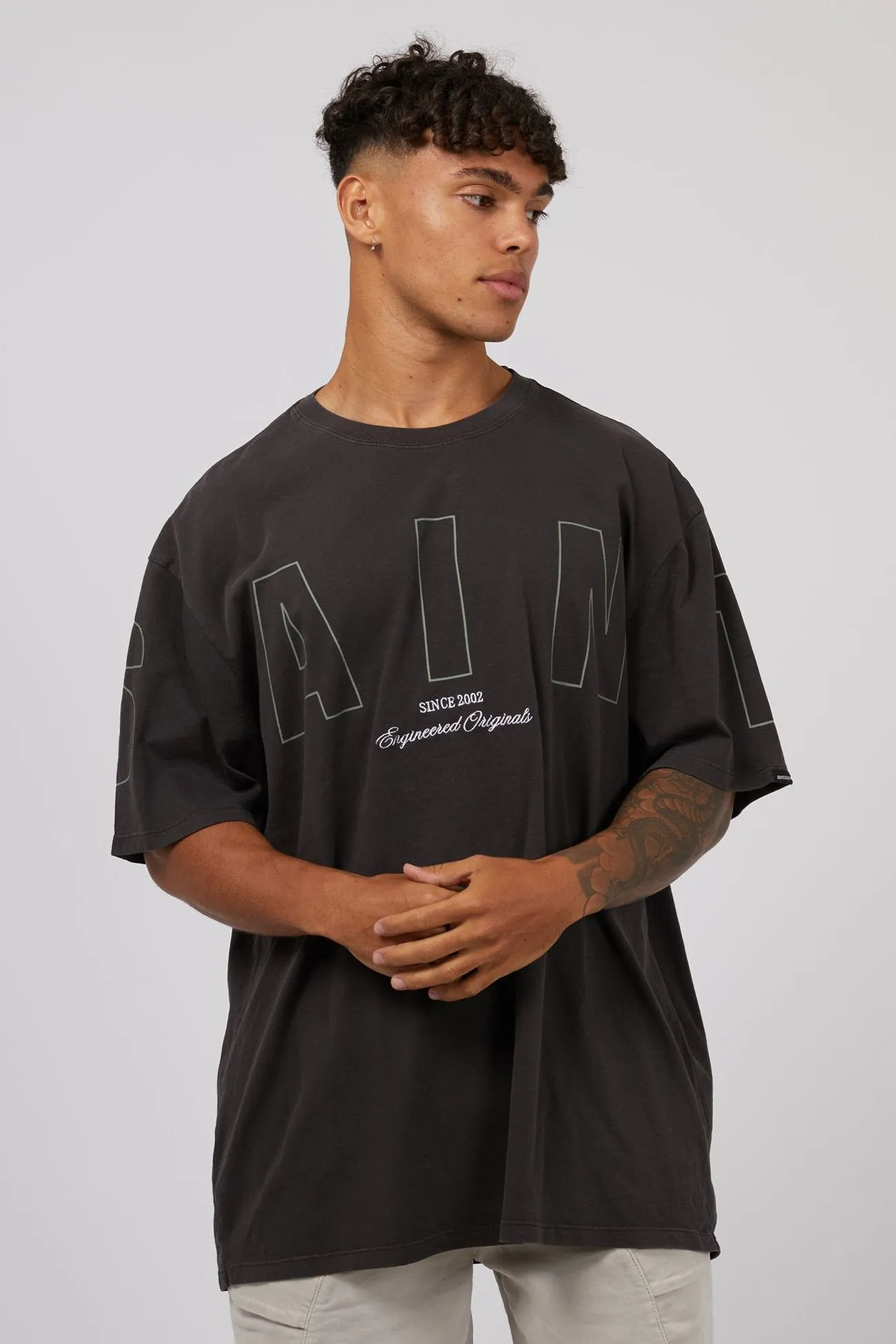 Riser Tee Washed Black SmoothZipper Raw Edge Detail