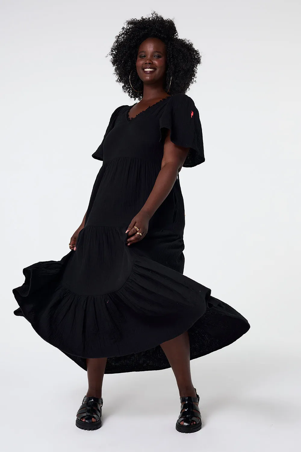 Timeless Wearable Black Flute Sleeve Tiered Midi Dress