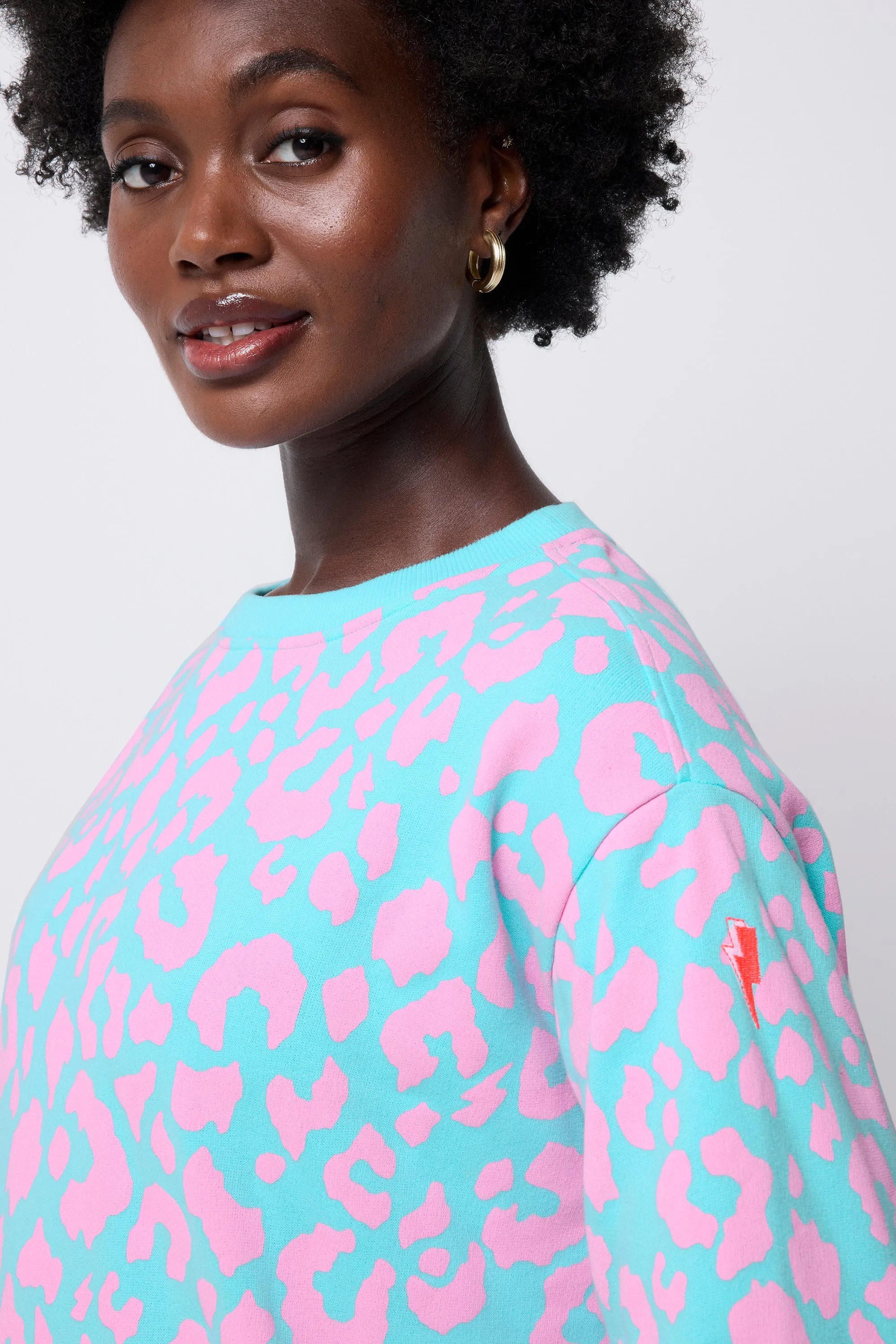 product innovation potential Turquoise with Pink Leopard Oversized Sweatshirt